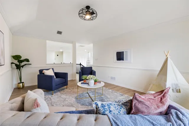 a living room with furniture and a couch