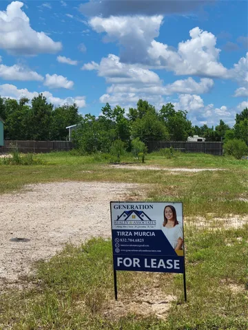 a view of a park with swings and slides