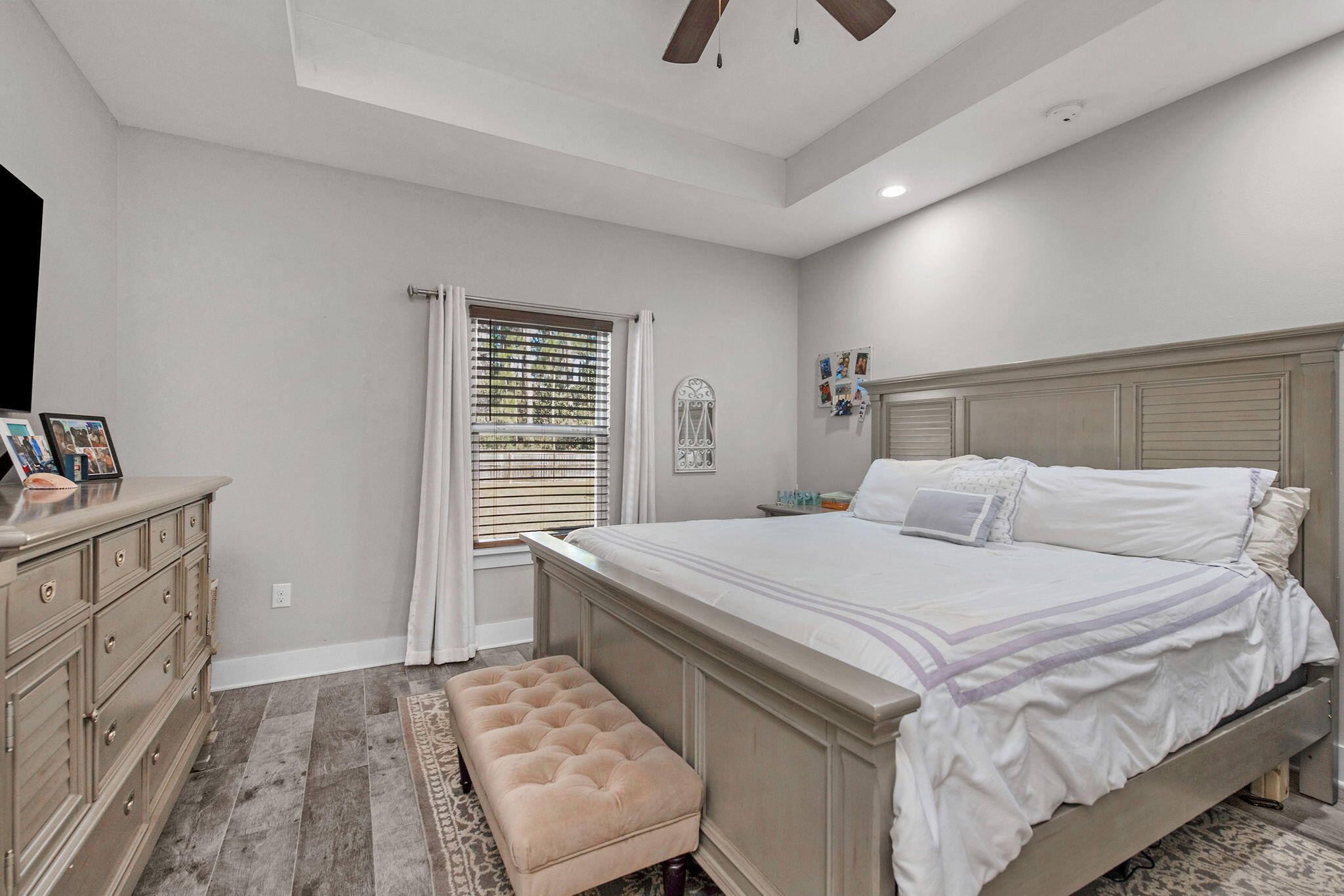 8914 Timber Lane Navarre, FL 32566 - Photo 18 of 40 a bedroom with a bed and a dresser