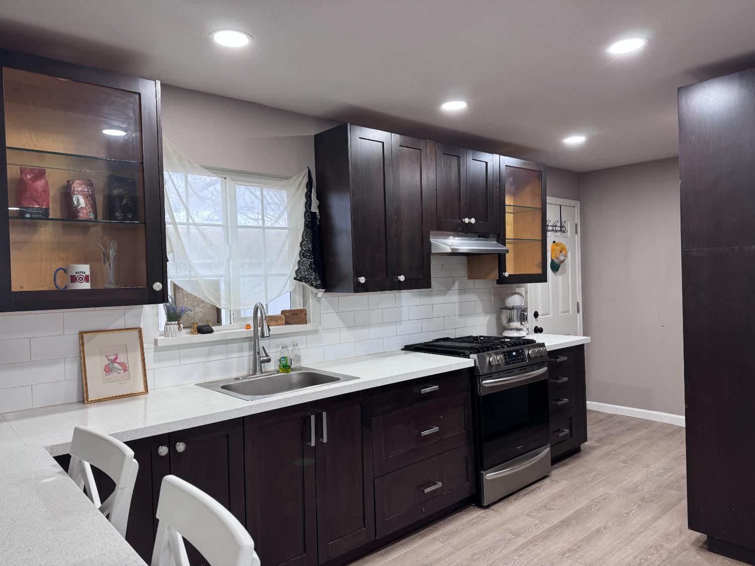 250 Davis Street Turlock, CA 95380 - Photo 2 of 18 Updated recessed lighting, eating bar