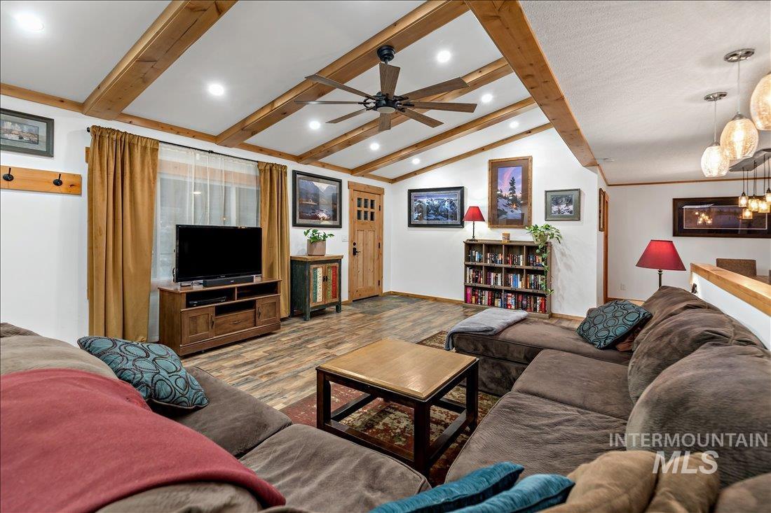 79 Sunset Loop Cascade, ID 83611 - Photo 5 of 44 Vaulted ceiling featuring exposed wood beams and recessed lighting