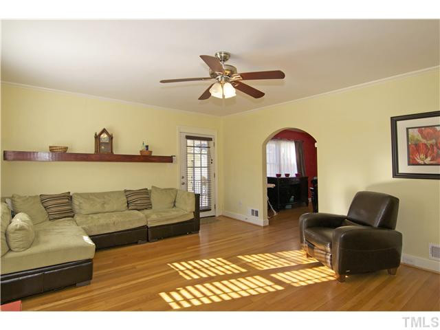 2932 Chapel Hill Road Durham, NC 27707 - Photo 2 of 21 Hardwood floors throughout home. Large & sunny living room with arched dooryway to dining room. Living Room