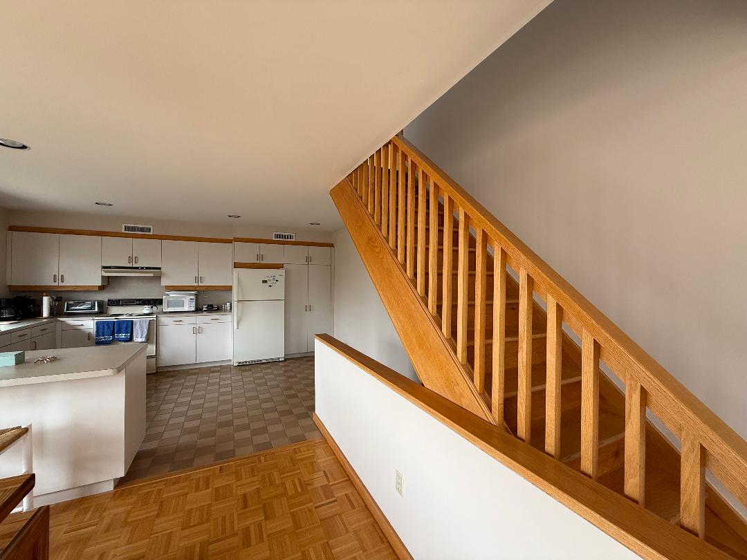 82 Oyster Pond Road Edgartown, MA 02539 - Photo 17 of 53 a view of kitchen with wooden floor and electronic appliances