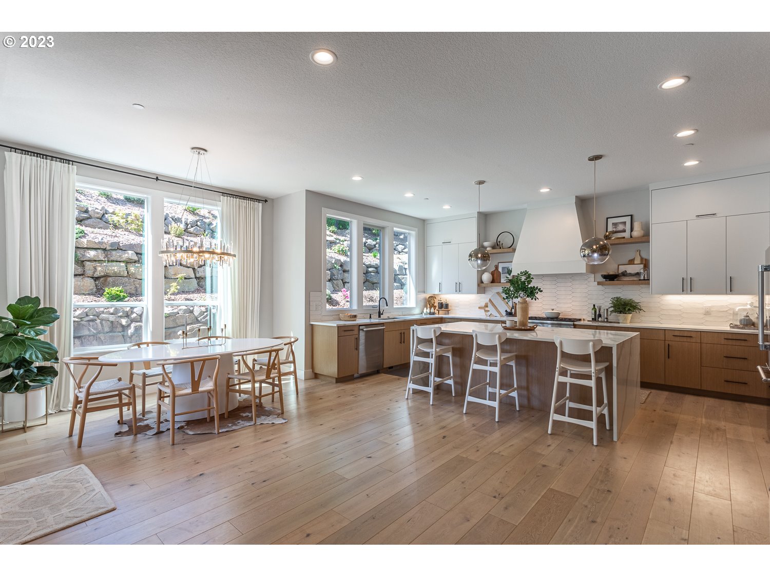 2000 Northwest 33rd Way Camas, WA 98607 - Photo 13 of 48 a kitchen with lots of counter top space and dining table