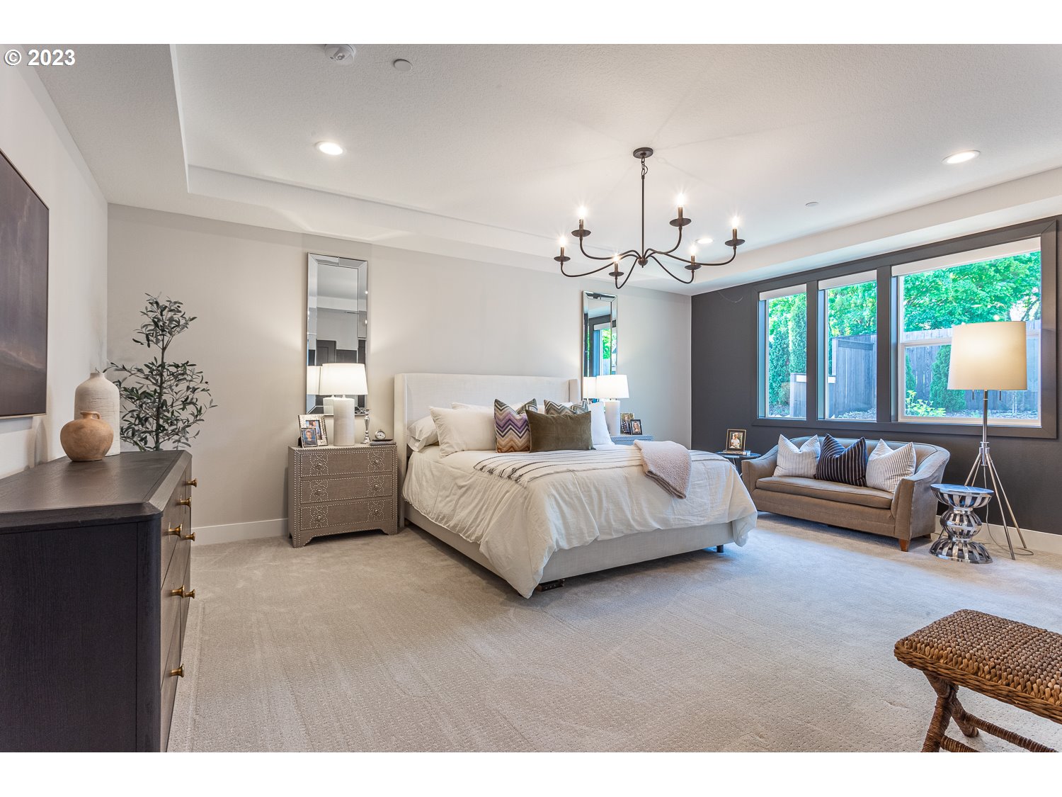 2000 Northwest 33rd Way Camas, WA 98607 - Photo 30 of 48 a spacious bedroom with a bed and a chandelier