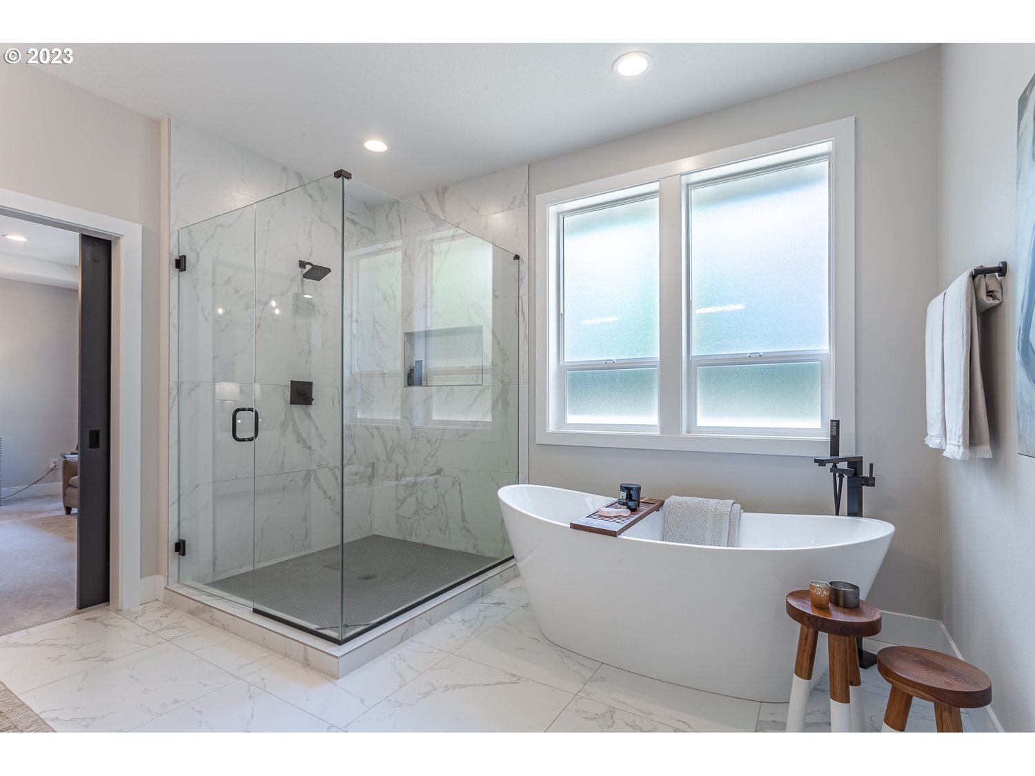 2000 Northwest 33rd Way Camas, WA 98607 - Photo 33 of 48 a bathroom with a bathtub and a shower