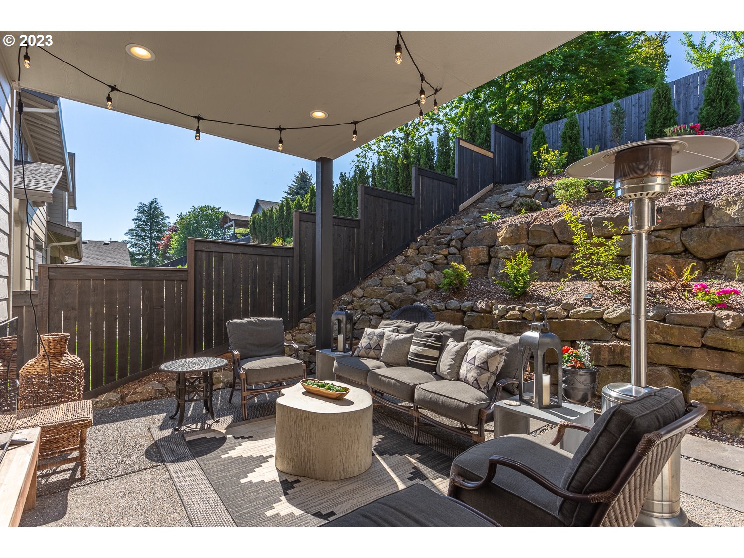 2000 Northwest 33rd Way Camas, WA 98607 - Photo 46 of 48 a building outdoor space with patio furniture and potted plants