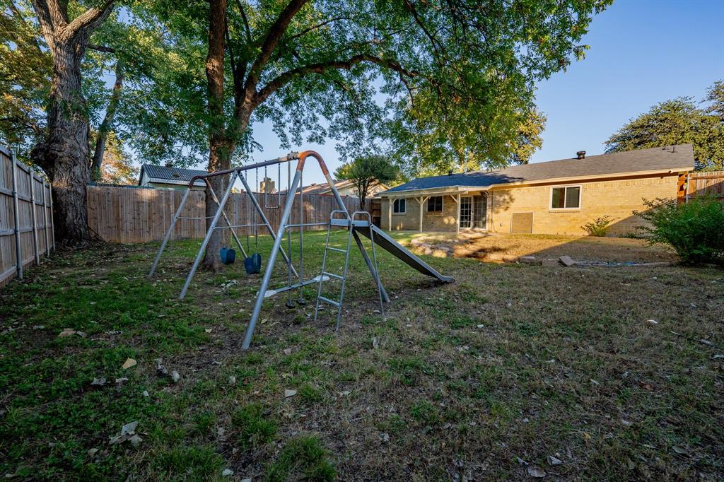2713 Springlake Court Irving, TX 75060 - Photo 14 of 14 a view of a house with backyard