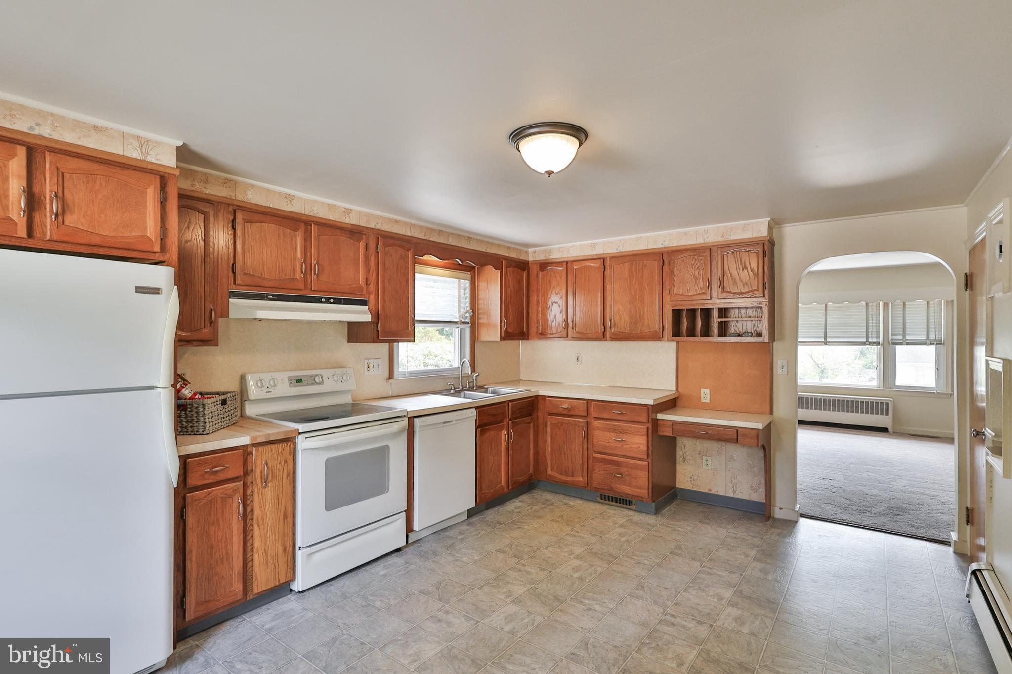 769 Lafayette Avenue Palmerton, PA 18071 - Photo 13 of 46 a kitchen with a sink stove and refrigerator