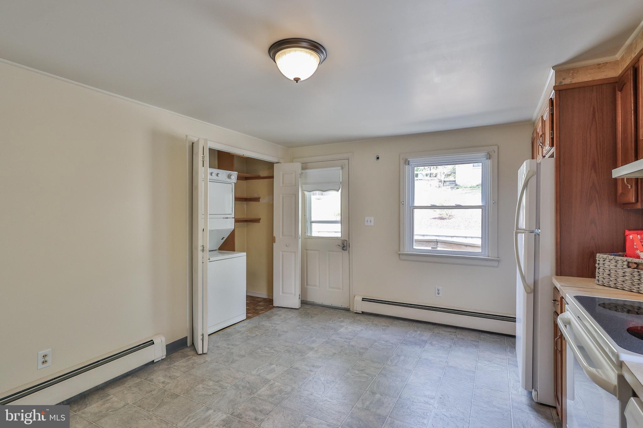 769 Lafayette Avenue Palmerton, PA 18071 - Photo 16 of 46 an empty room with a fireplace and window