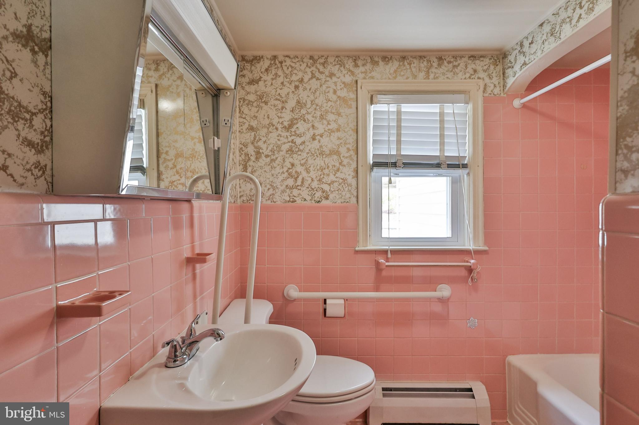 769 Lafayette Avenue Palmerton, PA 18071 - Photo 20 of 46 a bathroom with a sink a toilet and mirror