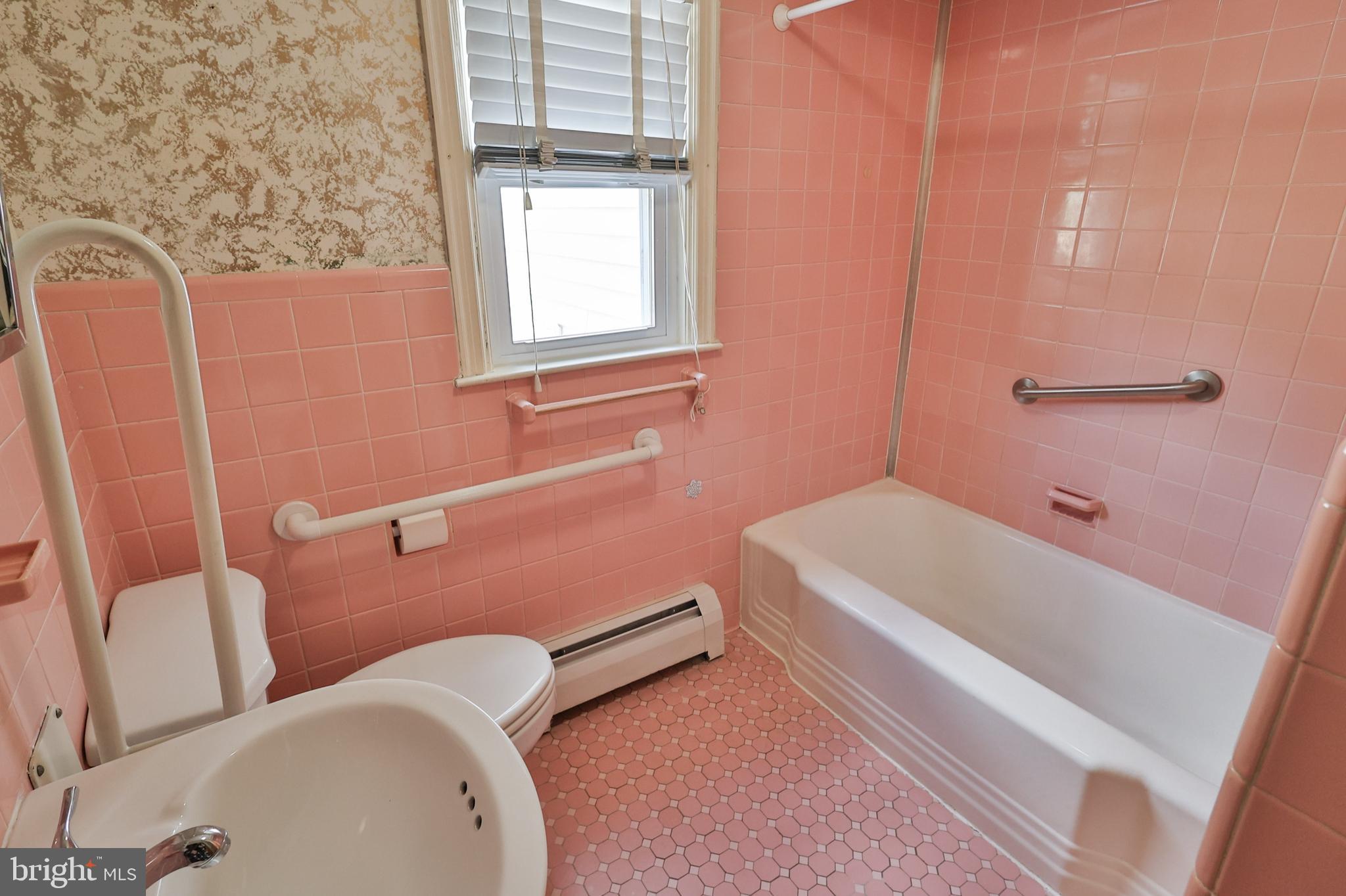 769 Lafayette Avenue Palmerton, PA 18071 - Photo 21 of 46 a bathroom with a sink and bathtub with toilet