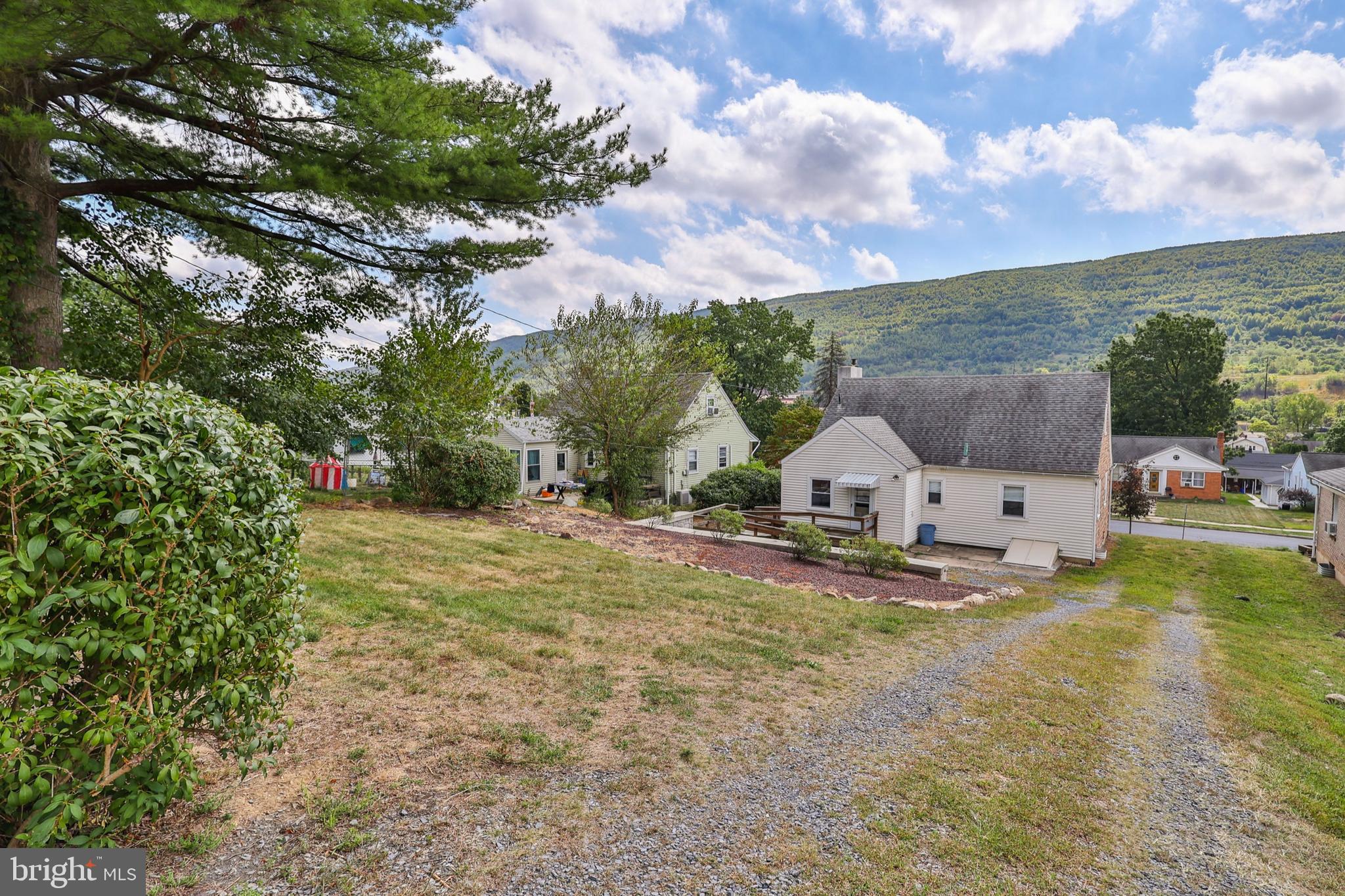 769 Lafayette Avenue Palmerton, PA 18071 - Photo 42 of 46 a view of a large garden with large trees