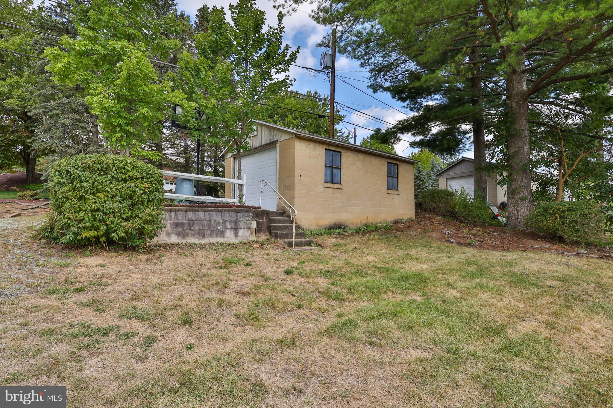 769 Lafayette Avenue Palmerton, PA 18071 - Photo 44 of 46 a house with trees in front of it