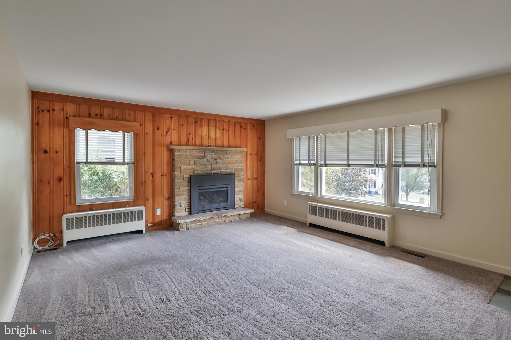 769 Lafayette Avenue Palmerton, PA 18071 - Photo 6 of 46 an empty room with windows and fireplace