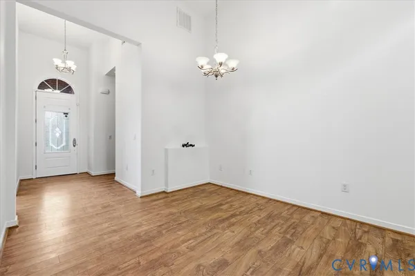 a view of a hallway with entryway