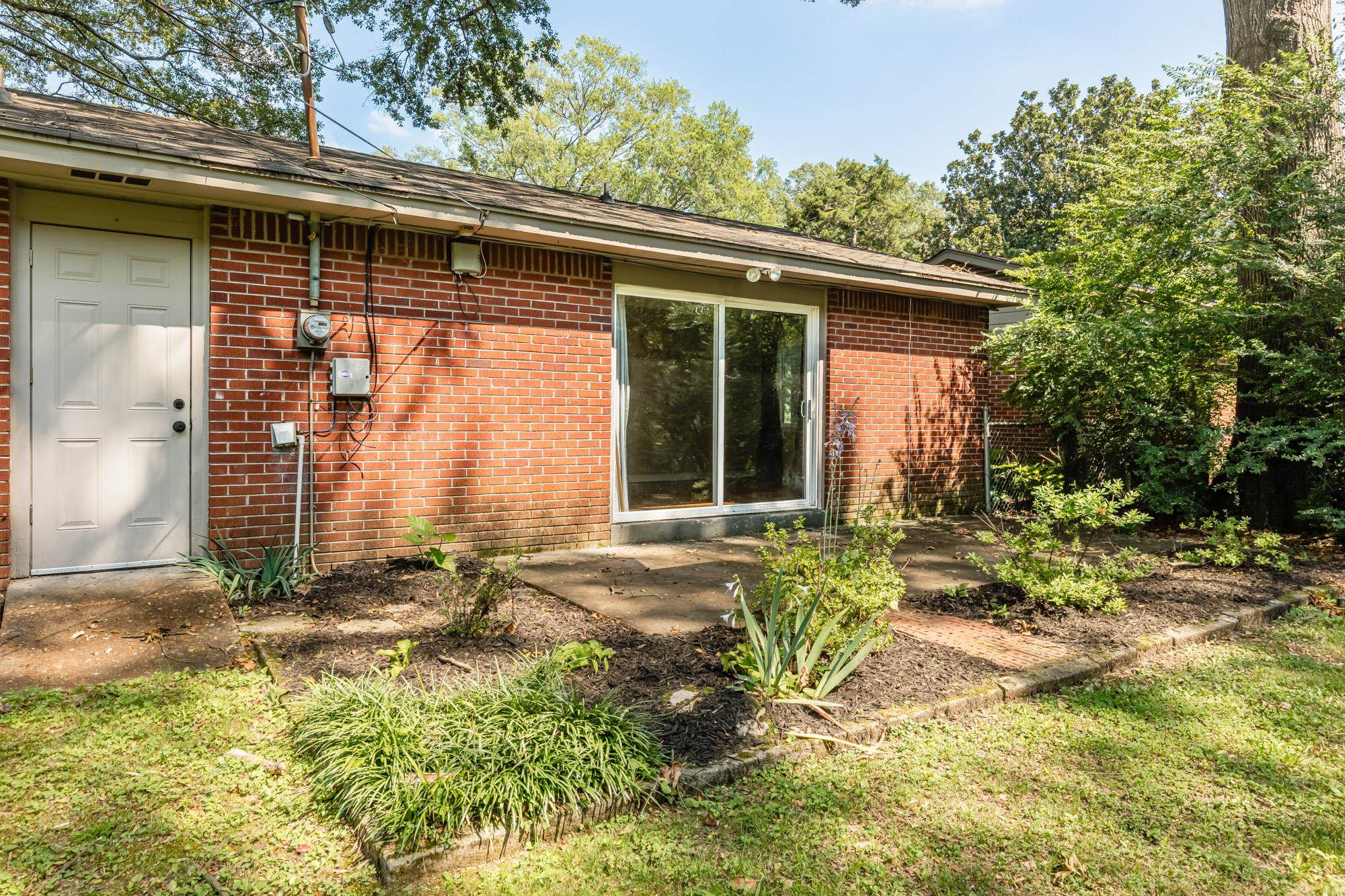 1081 Ivy Road Memphis, TN 38117 - Photo 11 of 25 a view of house with backyard and sitting area