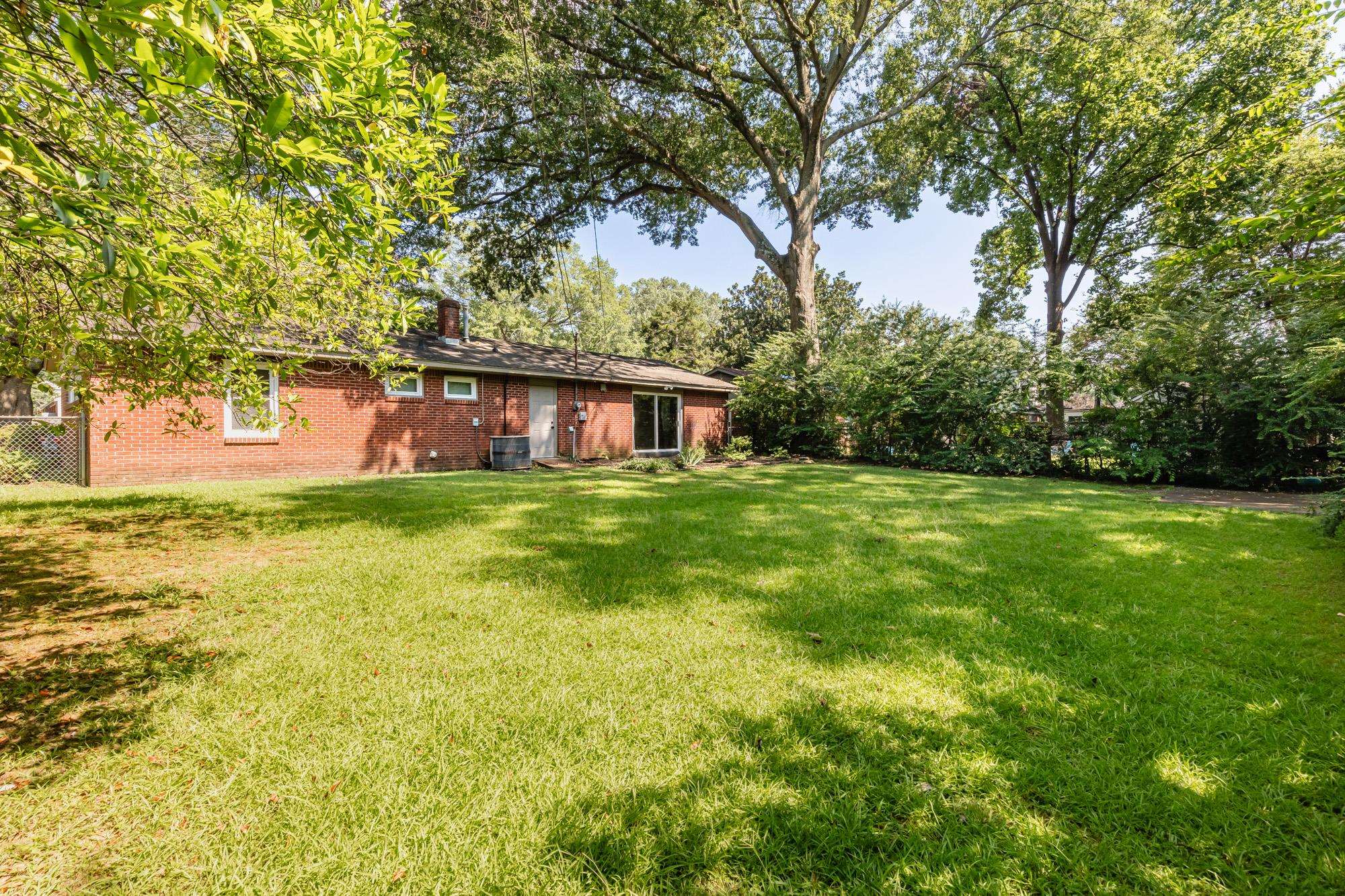 1081 Ivy Road Memphis, TN 38117 - Photo 12 of 25 a view of house with a big yard