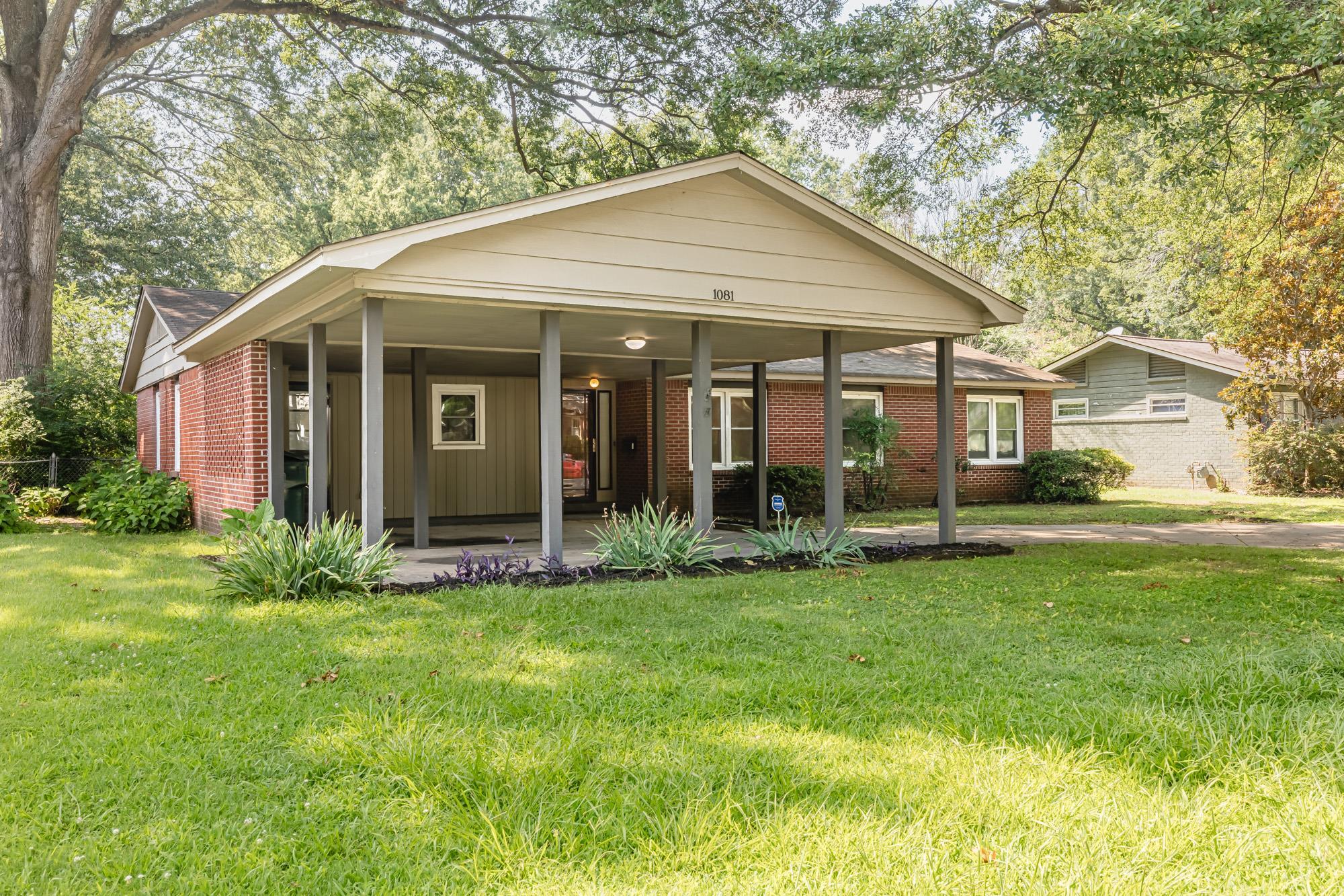 1081 Ivy Road Memphis, TN 38117 - Photo 14 of 25 a view of a house with yard and green space
