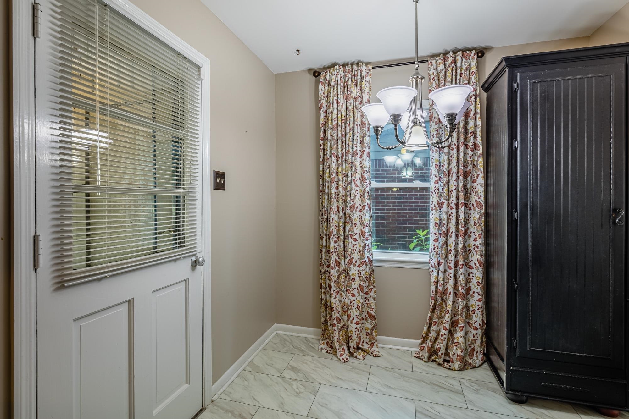 1081 Ivy Road Memphis, TN 38117 - Photo 18 of 25 a bathroom with a shower