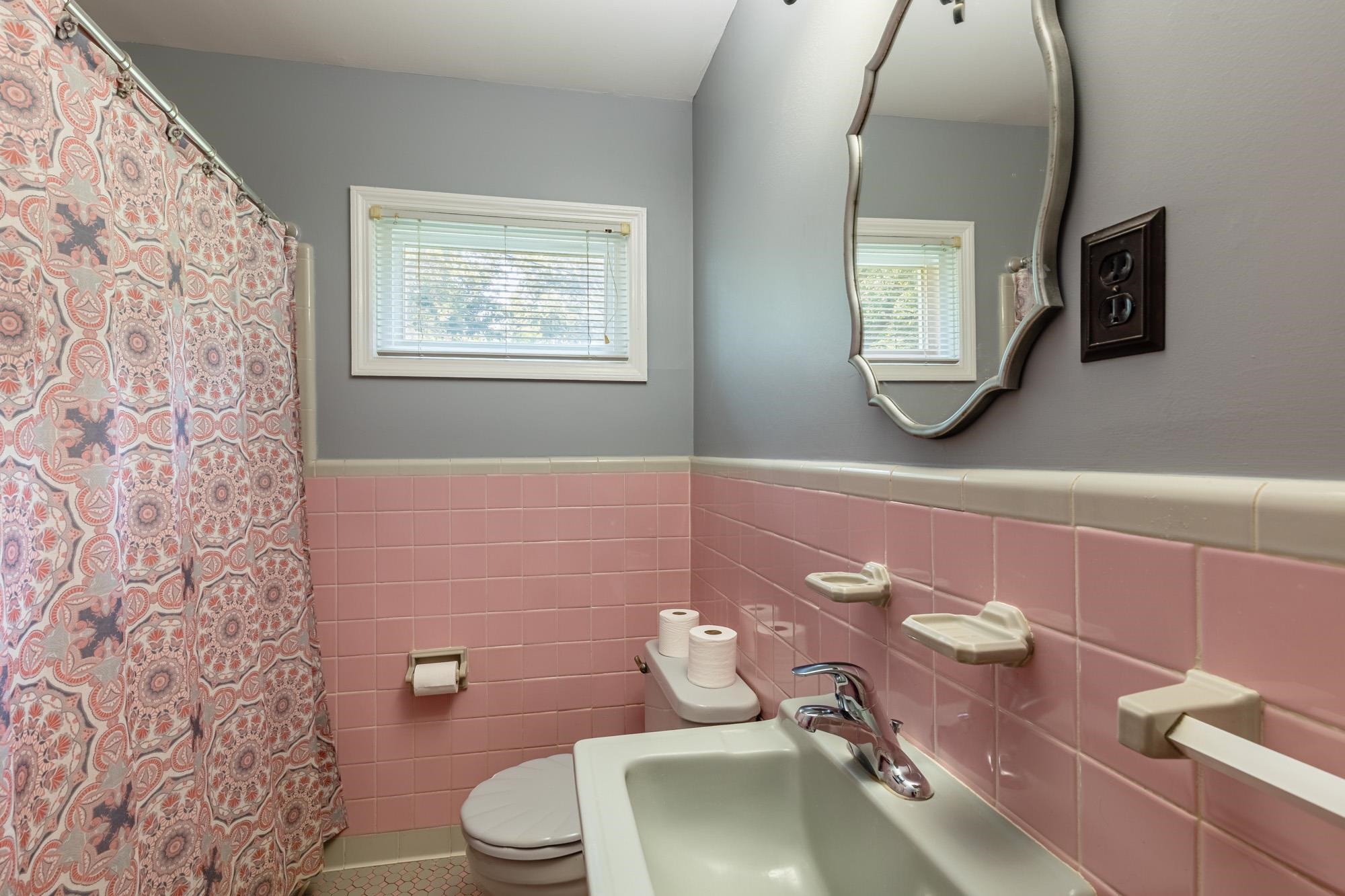 1081 Ivy Road Memphis, TN 38117 - Photo 21 of 25 a bathroom with a sink mirror and toilet