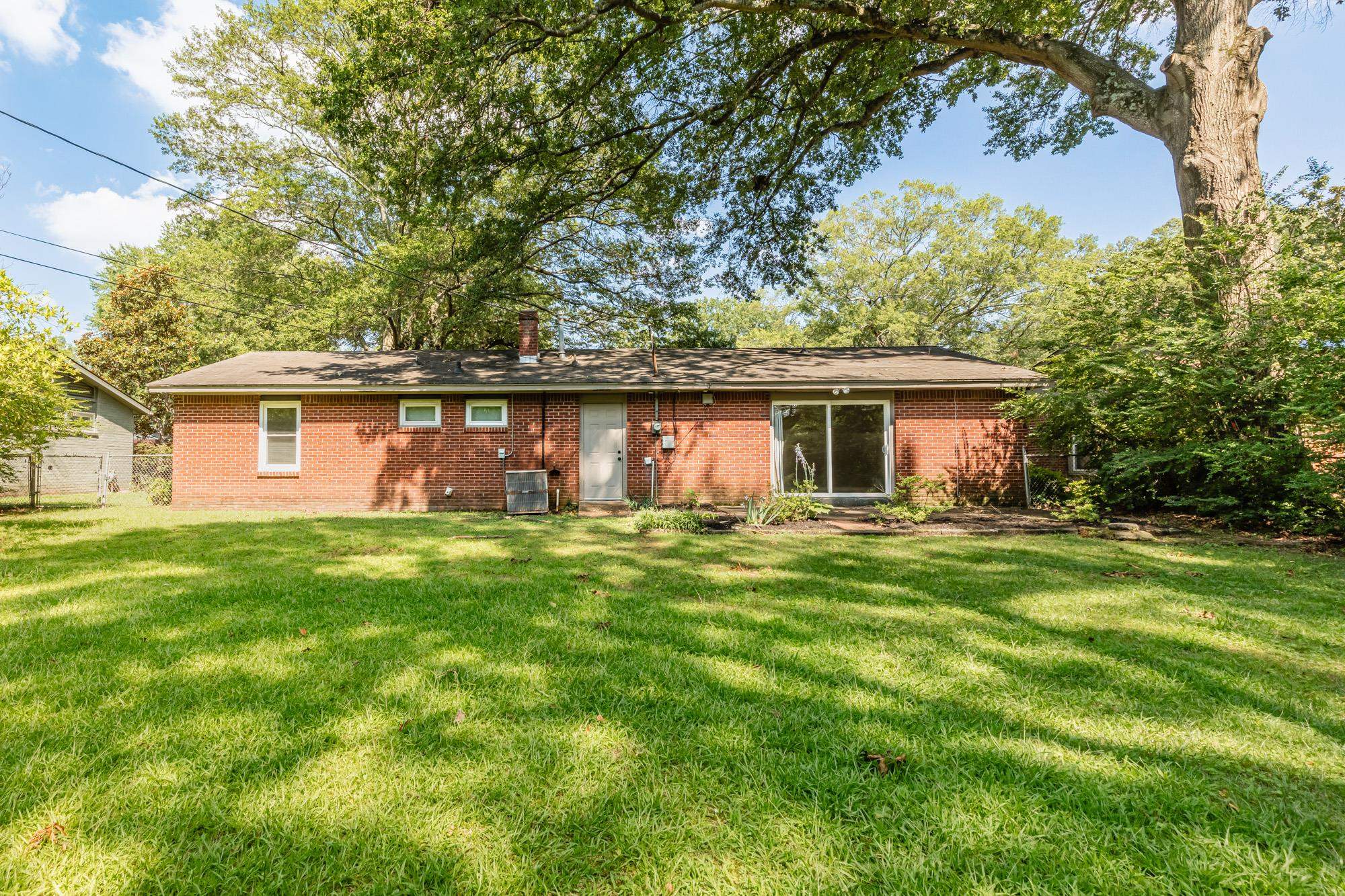 1081 Ivy Road Memphis, TN 38117 - Photo 25 of 25 a view of a house with a backyard