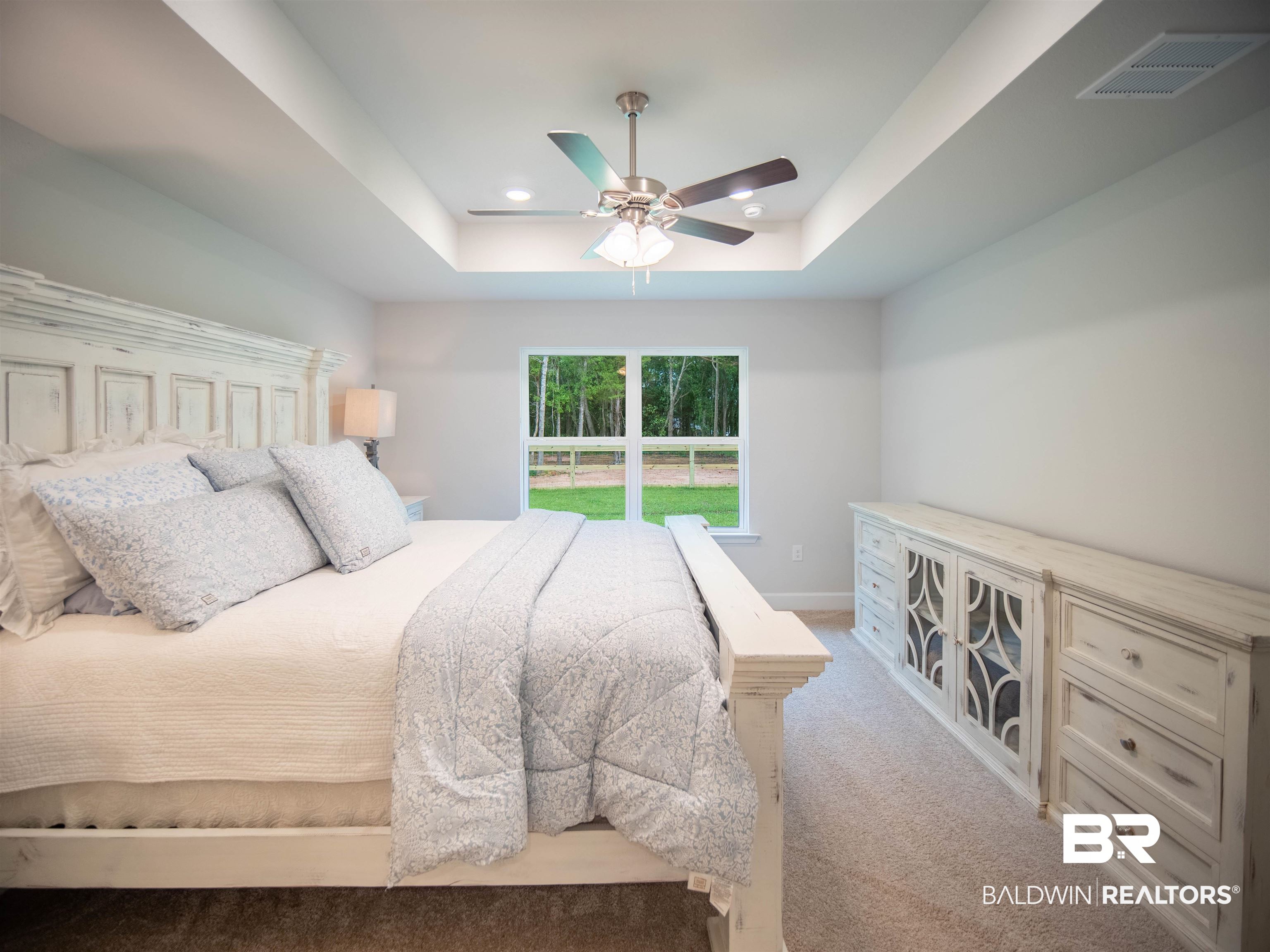 12646 Michigan Avenue Elberta, AL 36530 - Photo 15 of 47 Bedroom with a tray ceiling, carpet floors, a ceiling fan, and recessed lighting