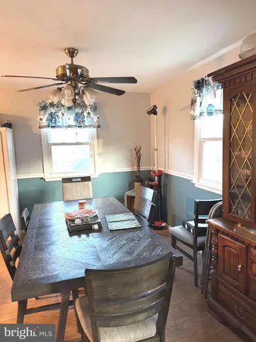 a work room with furniture and window