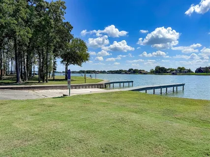 a view of a lake with a big yard
