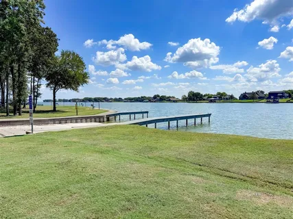 a view of a fountain and a big yard