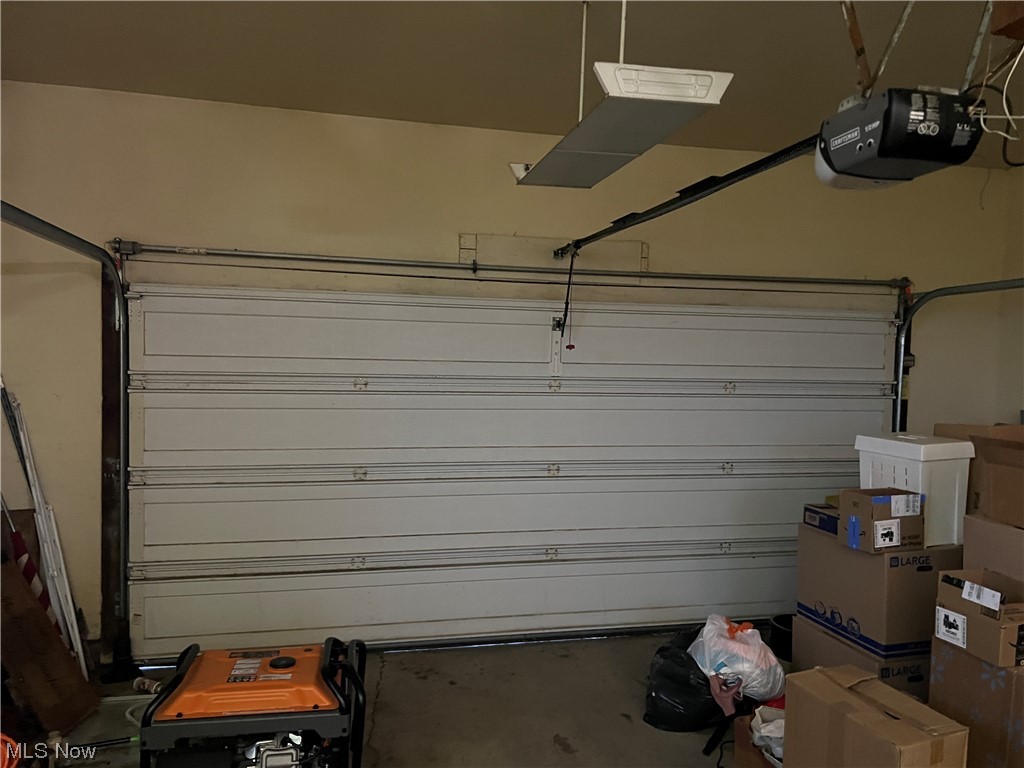 52995 Cash Ridge Road Shadyside, OH 43947 - Photo 21 of 32 Garage featuring a garage door opener