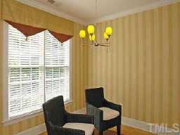 3701 Baron Cooper Pass, Unit 203 Raleigh, NC 27612 - Photo 6 of 10 Enjoy breakfast nook attached to kitchen with huge windows overlooking scenic view and bright natural lighting!