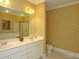 3701 Baron Cooper Pass, Unit 203 Raleigh, NC 27612 - Photo 8 of 10 Master Bath Speaks for itself! Has popular garden tub with separate shower, tile flooring, and built-in cabinets attached to large spacious vanity