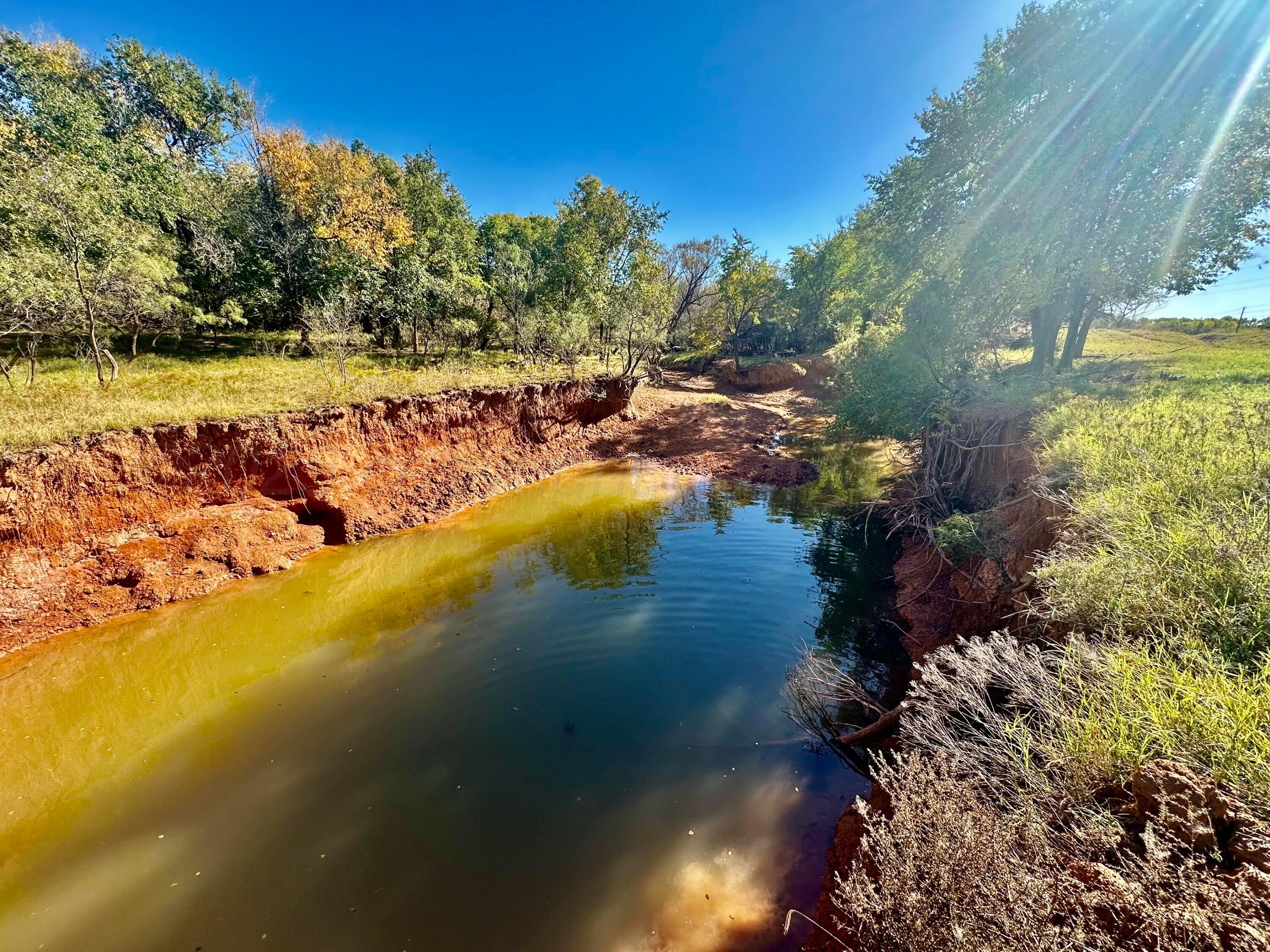 70 State Highway 70 Turkey, TX 79261 - Photo 21 of 28 a view of a lake with a yard