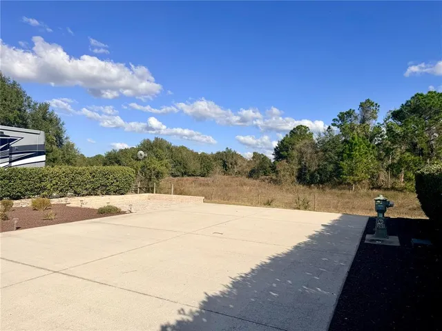 a view of swimming pool with a yard