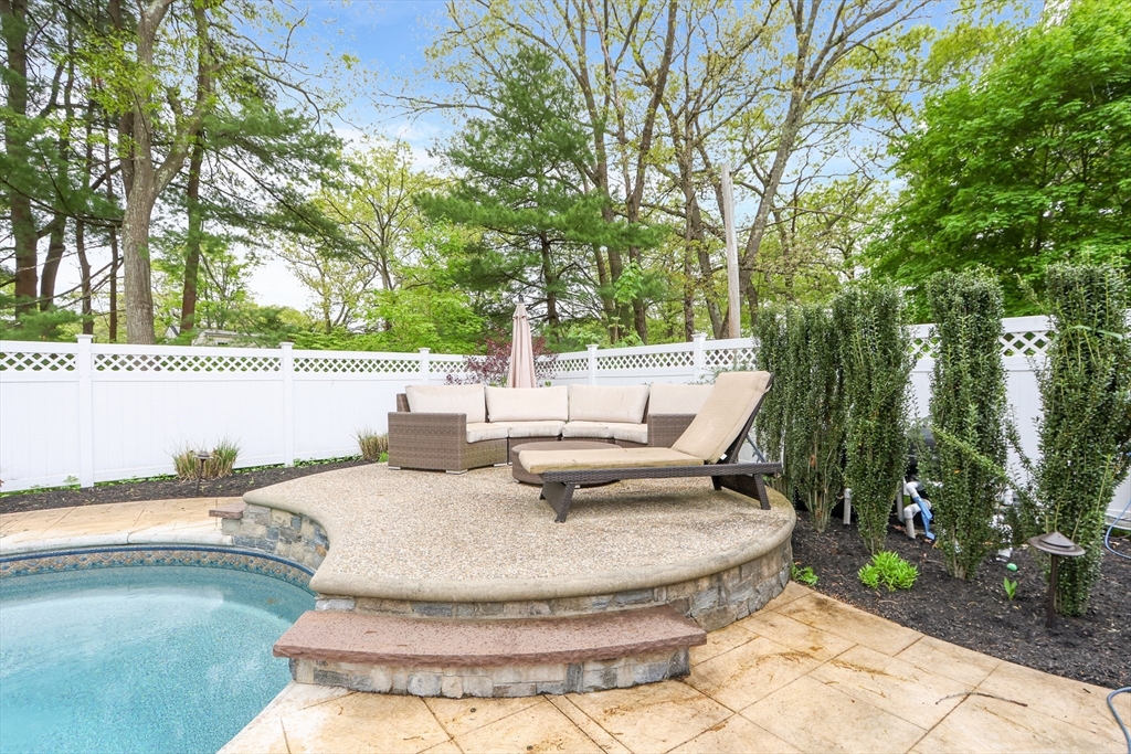 28 Longfellow Road Natick, MA 01760 - Photo 22 of 30 a view of swimming pool with seating space
