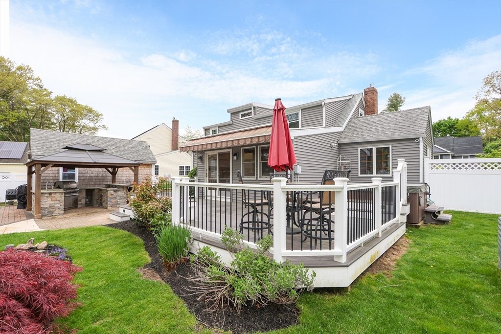 28 Longfellow Road Natick, MA 01760 - Photo 23 of 30 a front view of a house with garden