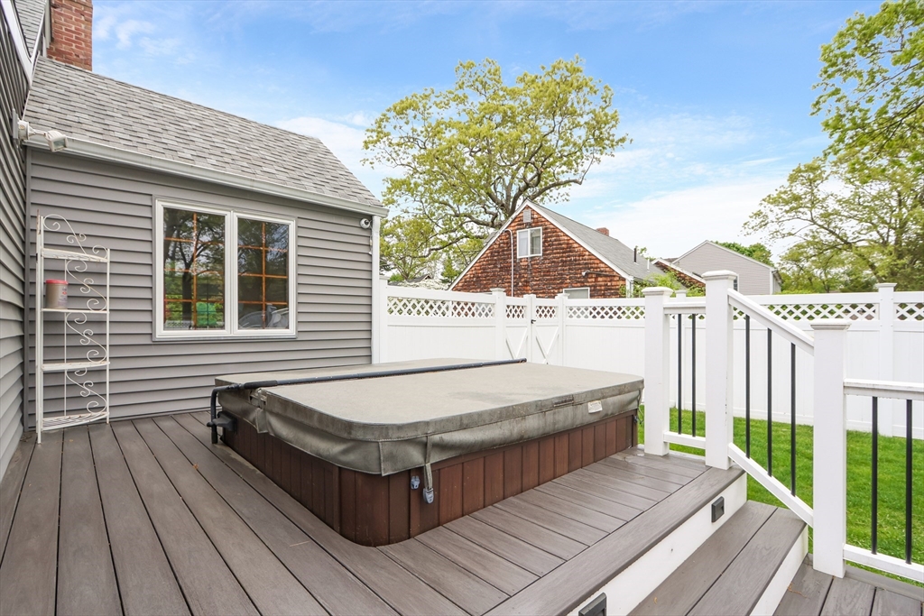 28 Longfellow Road Natick, MA 01760 - Photo 26 of 30 a view of backyard with a deck and wooden floor