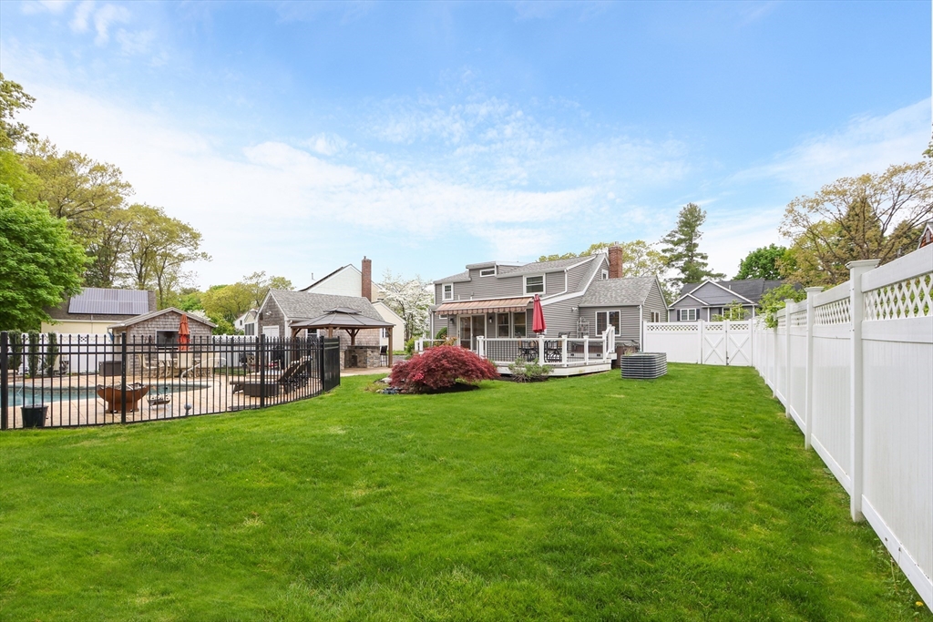 28 Longfellow Road Natick, MA 01760 - Photo 27 of 30 a house view with a garden space