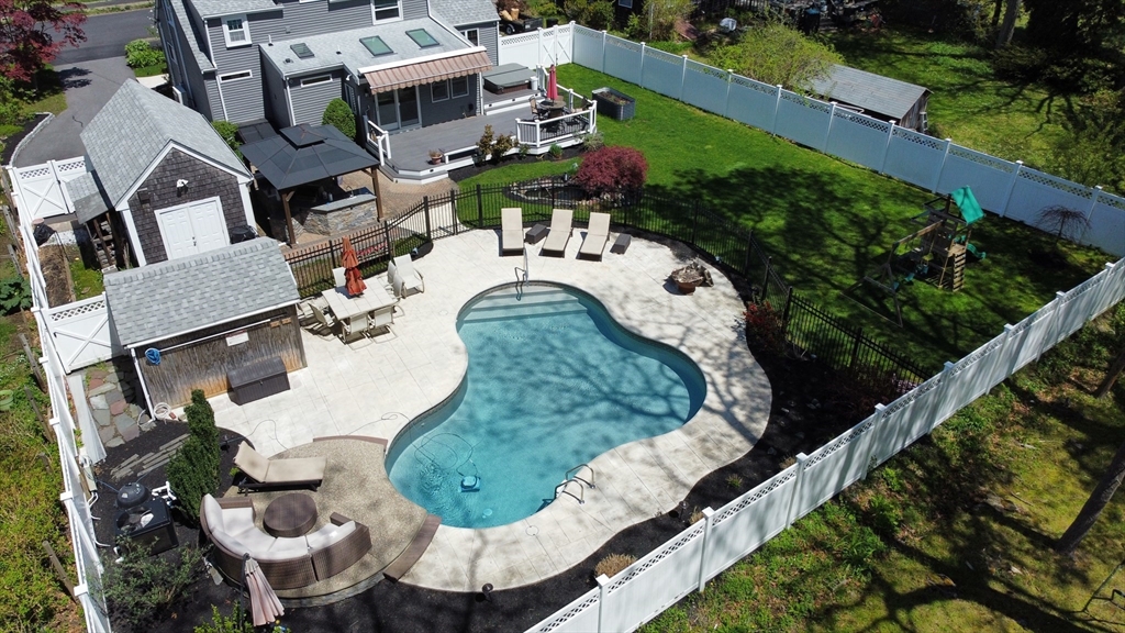 28 Longfellow Road Natick, MA 01760 - Photo 30 of 30 a view of a swimming pool with sitting area