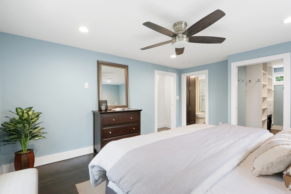 28 Longfellow Road Natick, MA 01760 - Photo 10 of 30 a bedroom with a bed and a potted plant