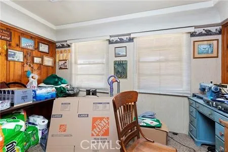 a dining table chair and a stove