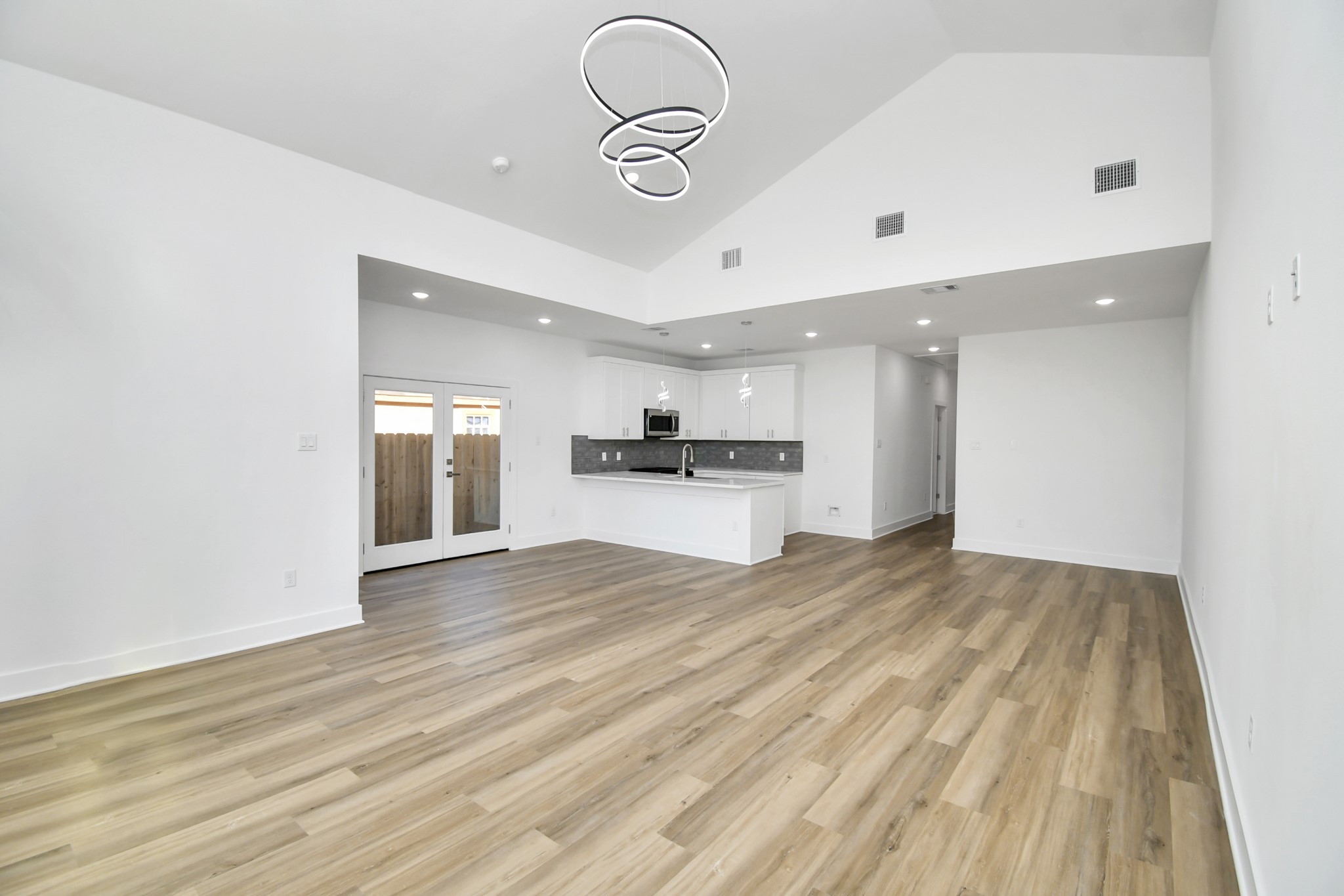 8109 Hamlet Street Houston, TX 77078 - Photo 11 of 50 a view of a kitchen with a sink and wooden floor