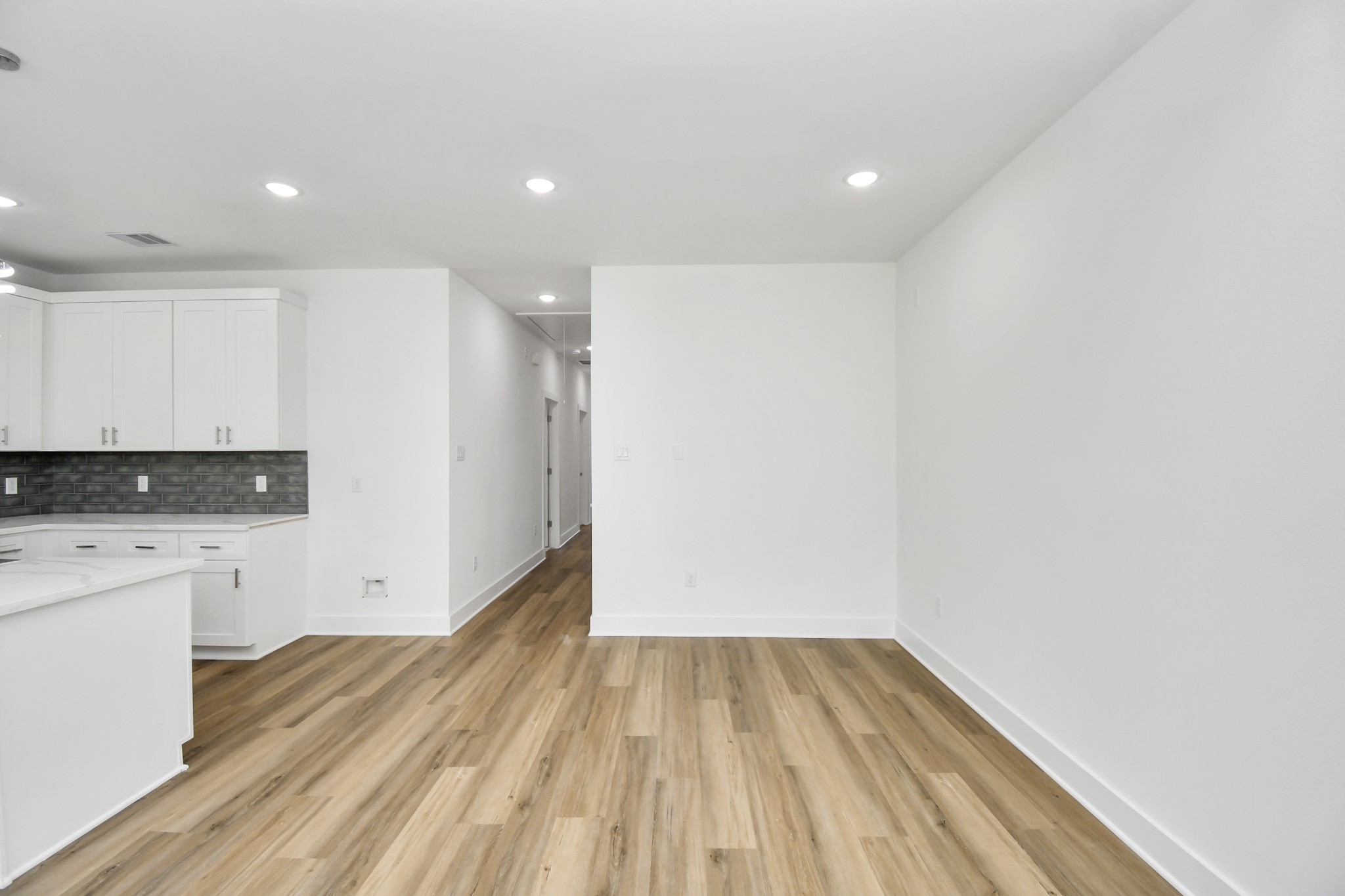 8109 Hamlet Street Houston, TX 77078 - Photo 12 of 50 a view of hallway with wooden floor