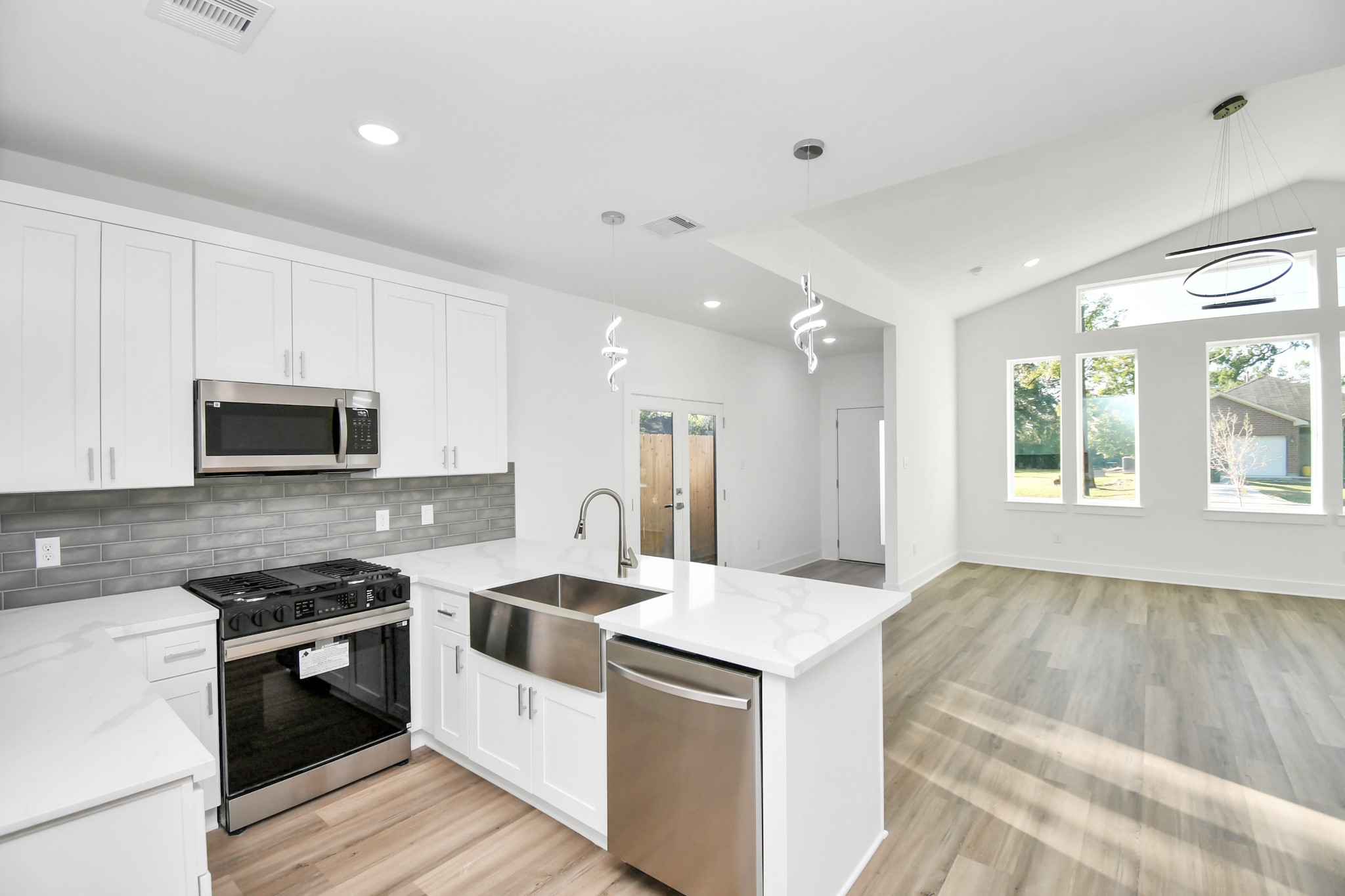 8109 Hamlet Street Houston, TX 77078 - Photo 37 of 50 a kitchen with a stove and a sink