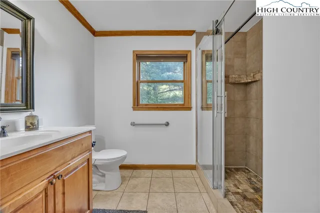 a view of a chairs and table in the patio