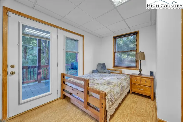 a bed room with a bed and furniture