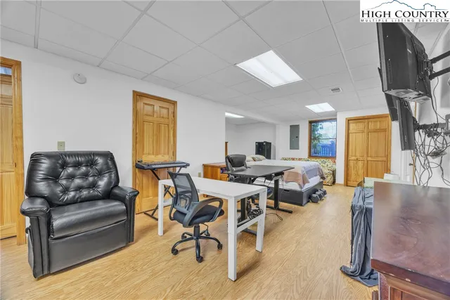 a bathroom with a toilet a sink and a mirror