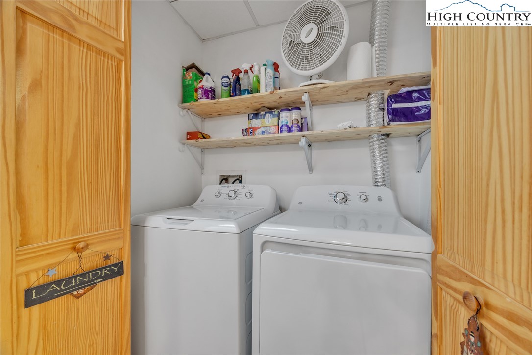 98 New Ridge Lane Piney Creek, NC 28663 - Photo 35 of 50 a utility room with dryer and washer