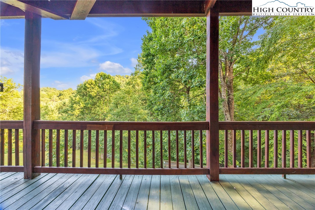 98 New Ridge Lane Piney Creek, NC 28663 - Photo 37 of 50 a view of balcony with wooden floor